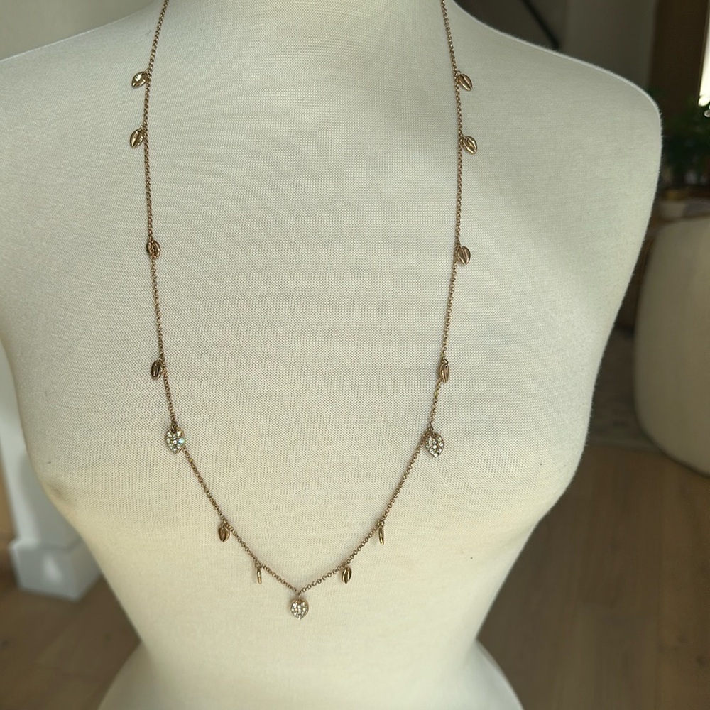 Elegant Gold Necklace with Leaf Charms